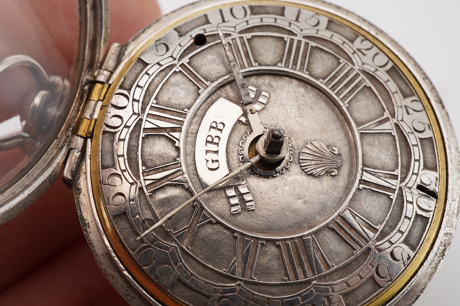 A George II silver pair cased keywind verge pocket watch by James Gibb of Stockton, (a.f.), with silvered Roman dial, inscribed Gibb and decorated with a shell, the signed movement unnumbered, inner case diameter 39mm an